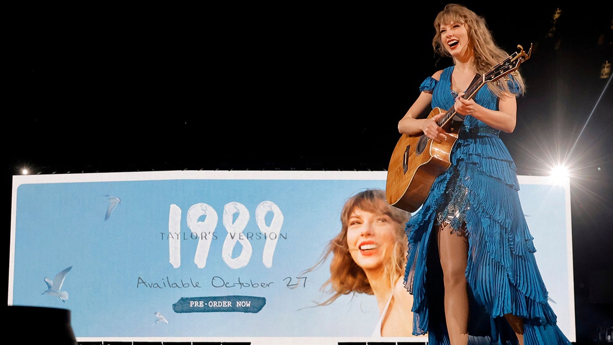 Taylor Swift rocks bold blue dress on stage in Los Angeles for Eras Tour