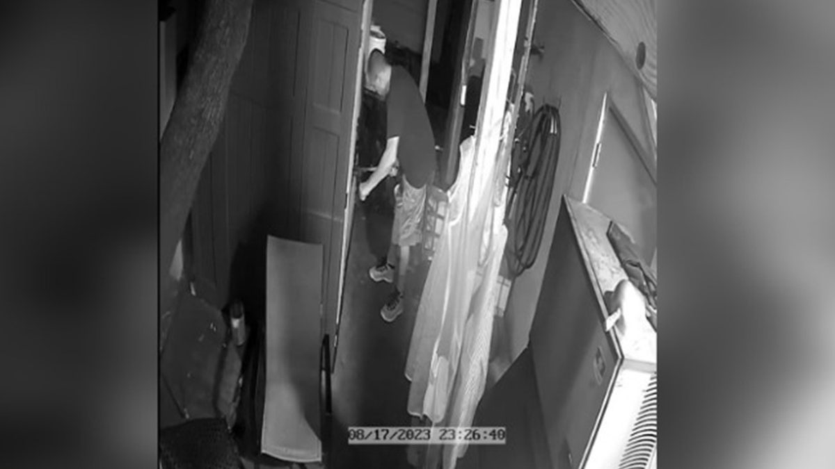 Male suspect breaking in