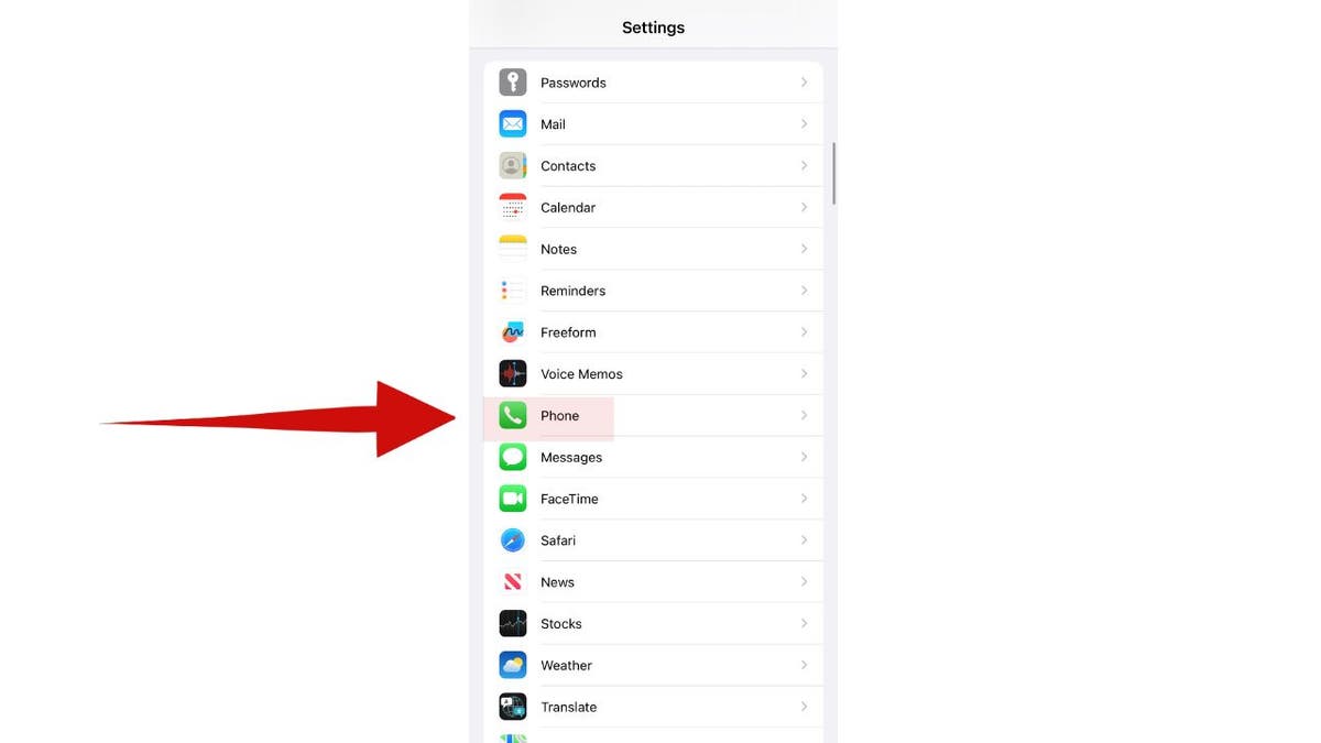 Screenshot of red arrow pointing to the "Phone" option in Settings on an iPhone