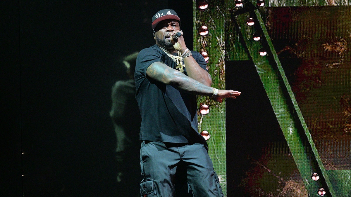 50 Cent performing on stage