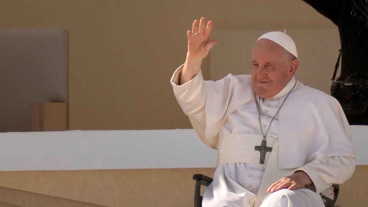 Pope waving