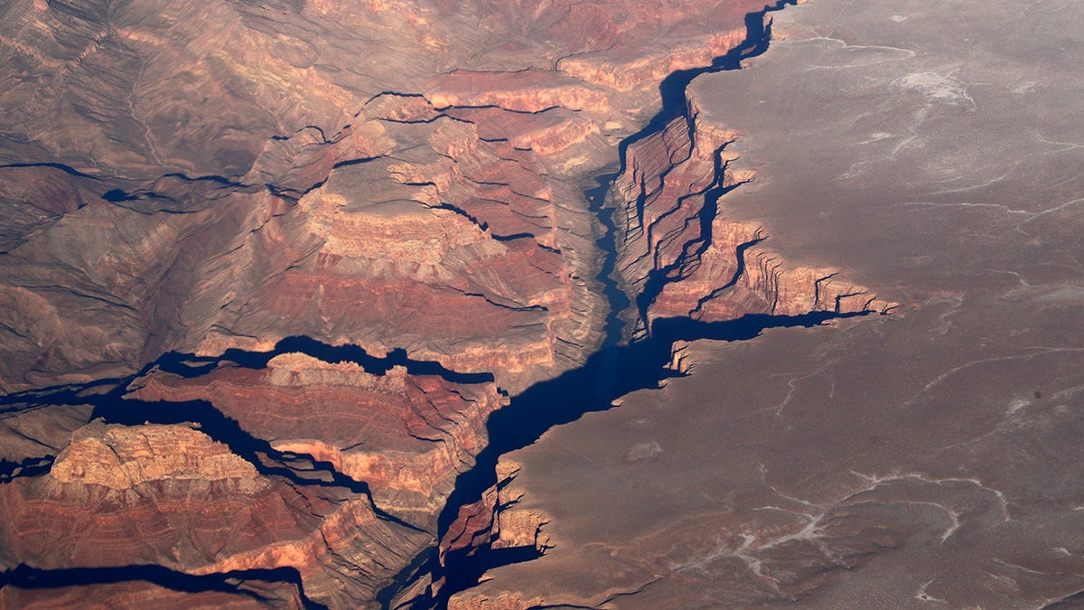 Aerial view showing red rock formations of the Grand Canyon