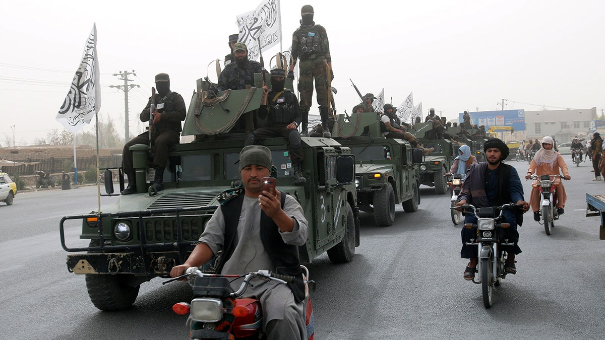 Taliban troops on a truck