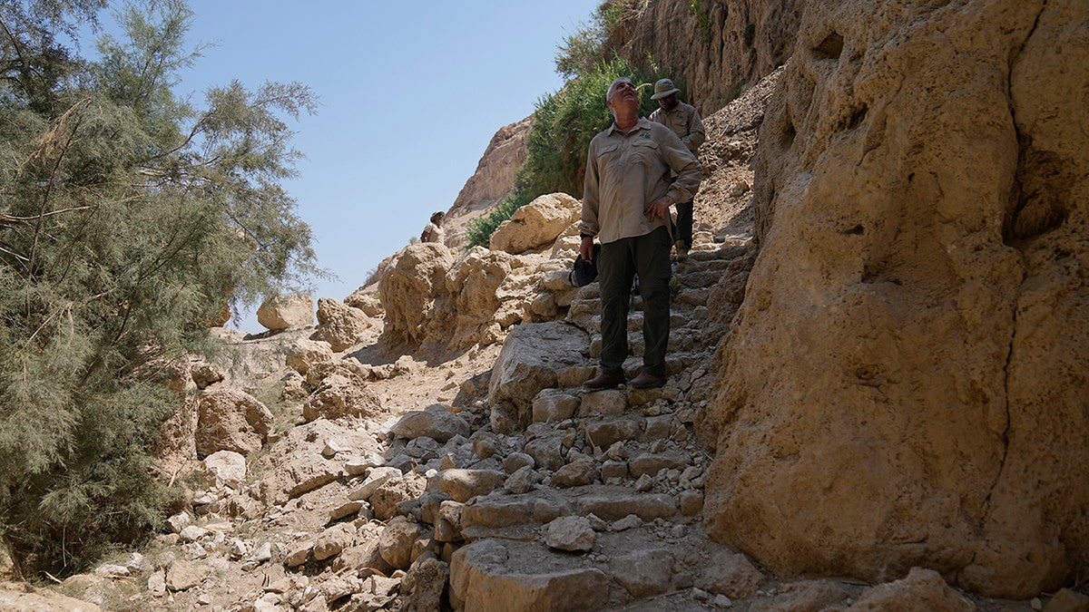 A photo of rocks, a trail