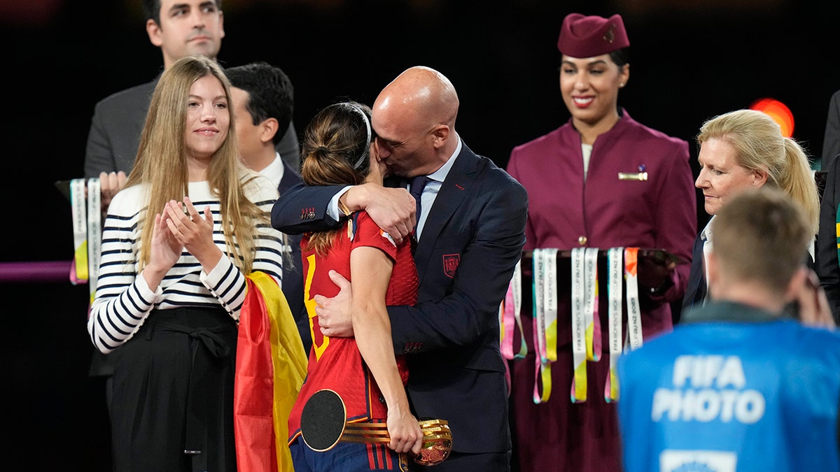 Luis Rubiales kissing a player