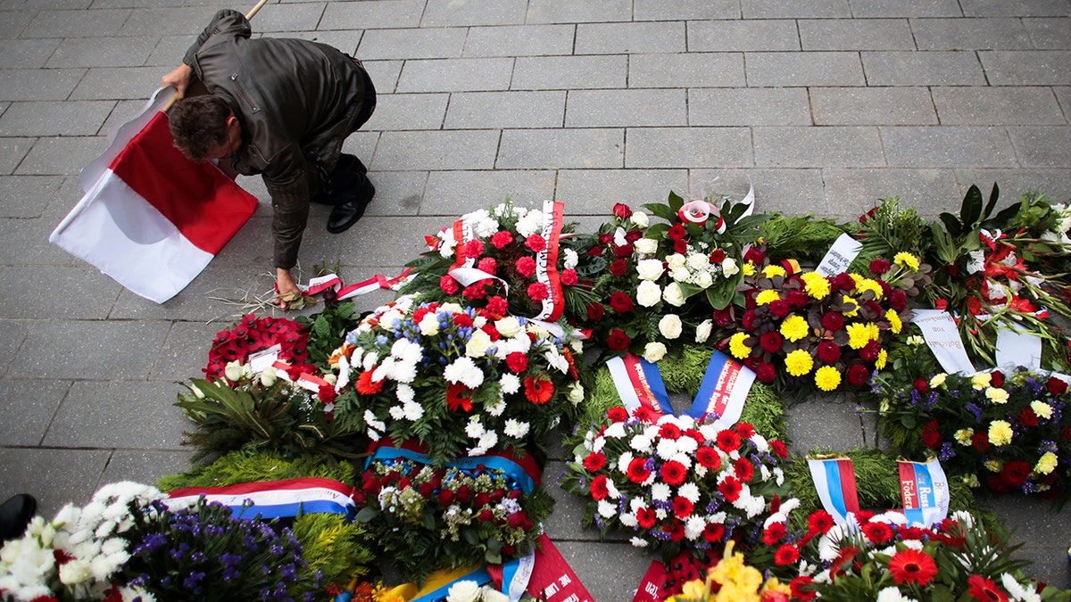 Polish flags on memorial