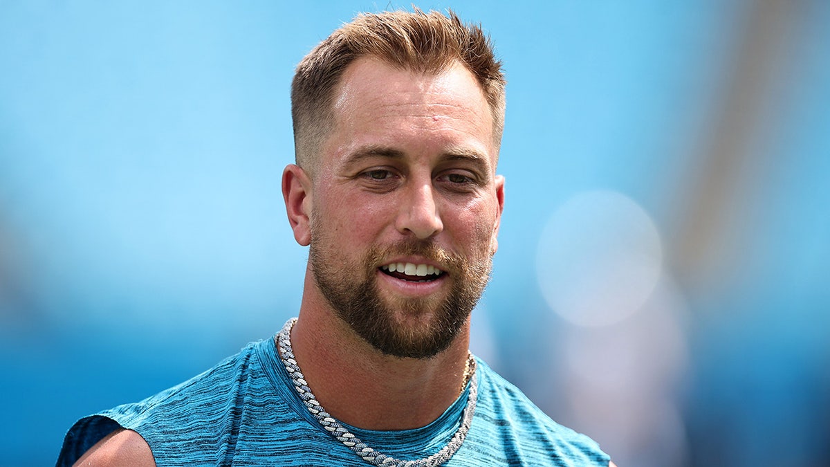 Adam Thielen looks on prior to a Panthers preseason game