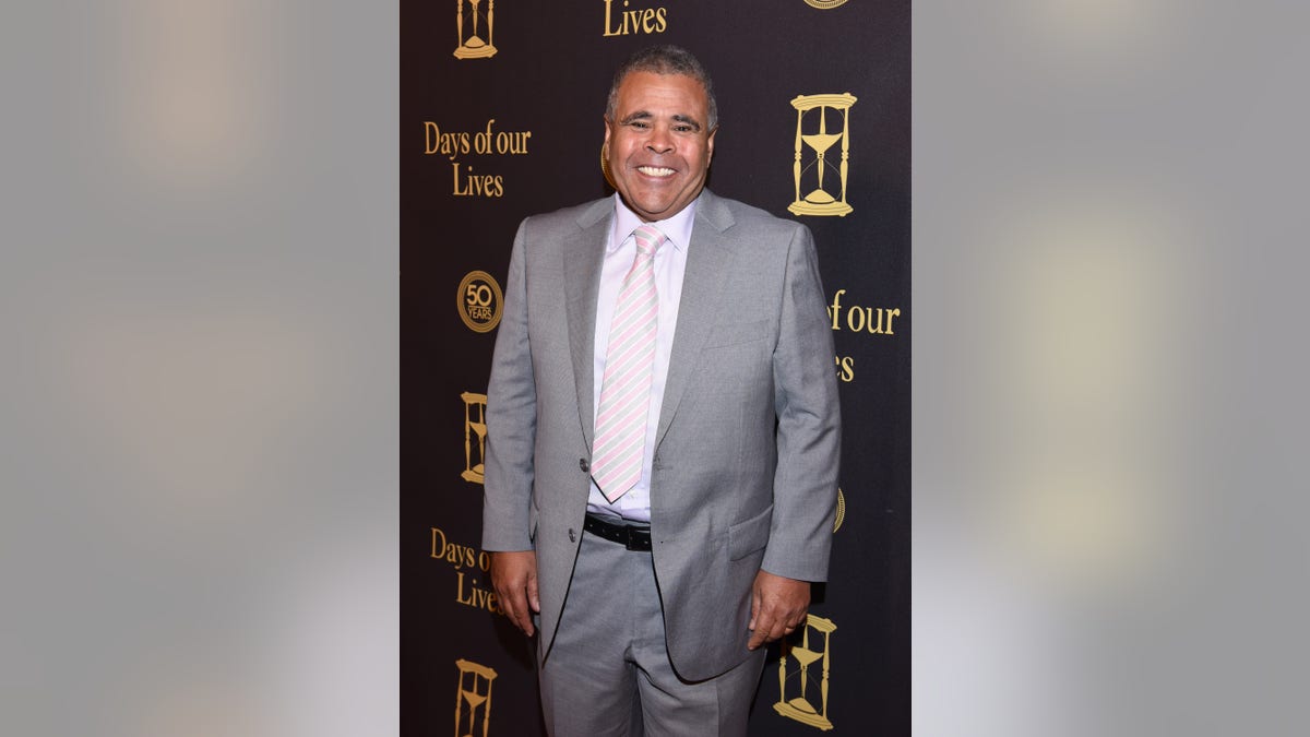Albert Alarr posing on the red carpet