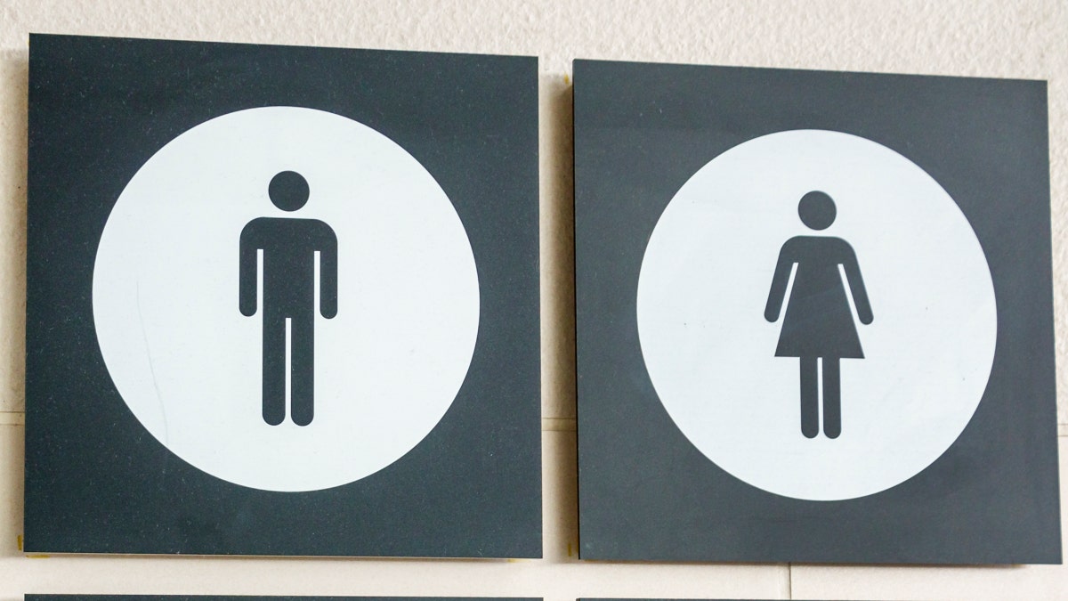 Bathroom signs for antheral  (left) and pistillate  (right)