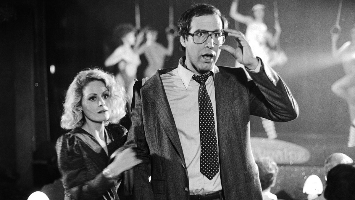 Beverly D'Angelo and Chevy Chase on set