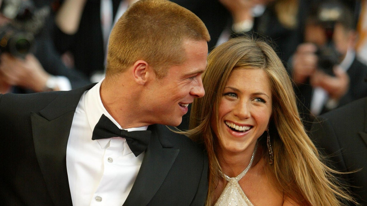 Brad Pitt and Jennifer Aniston attend a premiere