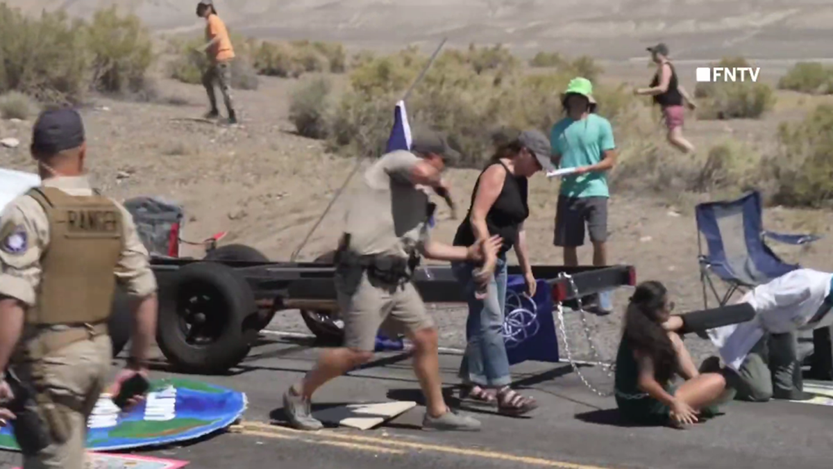 Chaotic video shows police breaking up Burning Man climate protest ...