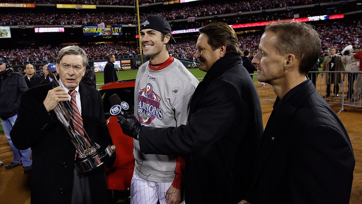 Cole Hamels with World Series trophy