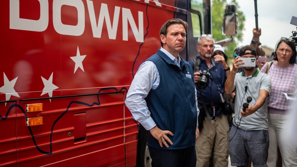 Florida Governor Ron DeSantis speaks with members of the media