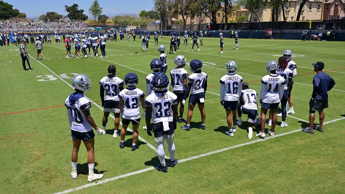 Cowboys players participate in practice drills 