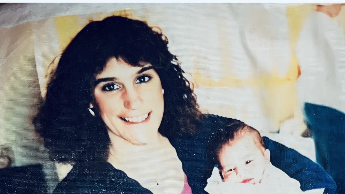 Deborah Mowrey-Marshall holding her daughter Catrina Marshall