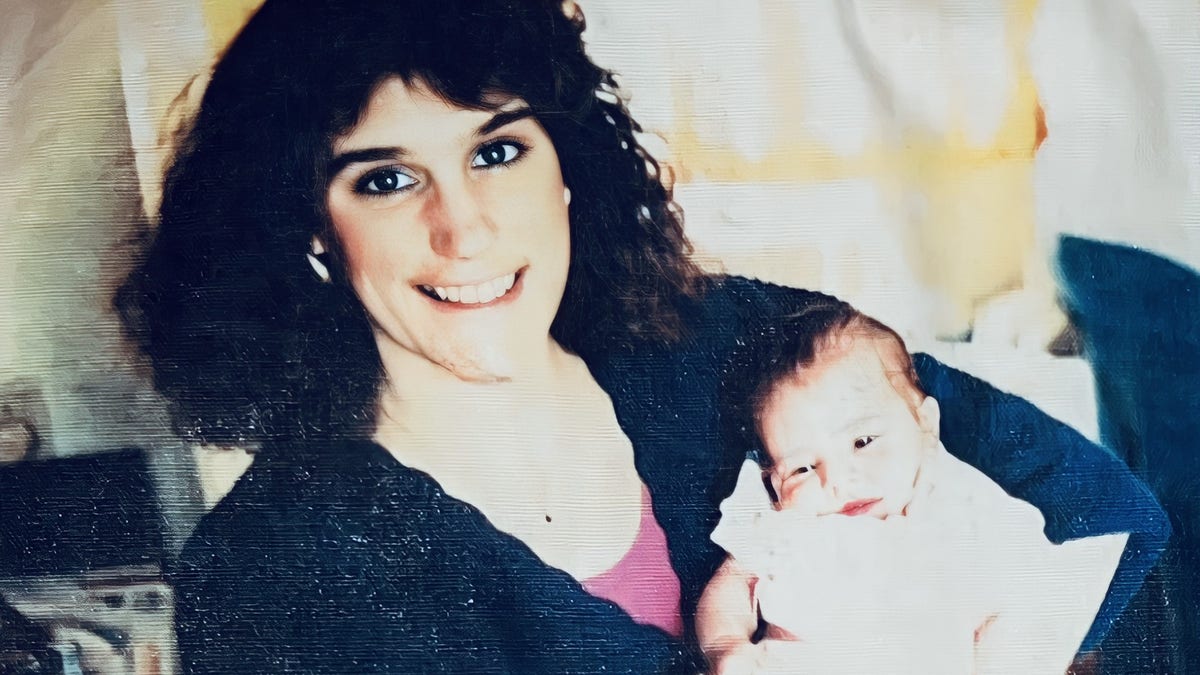 Deborah Mowrey-Marshall holding her daughter Catrina Marshall