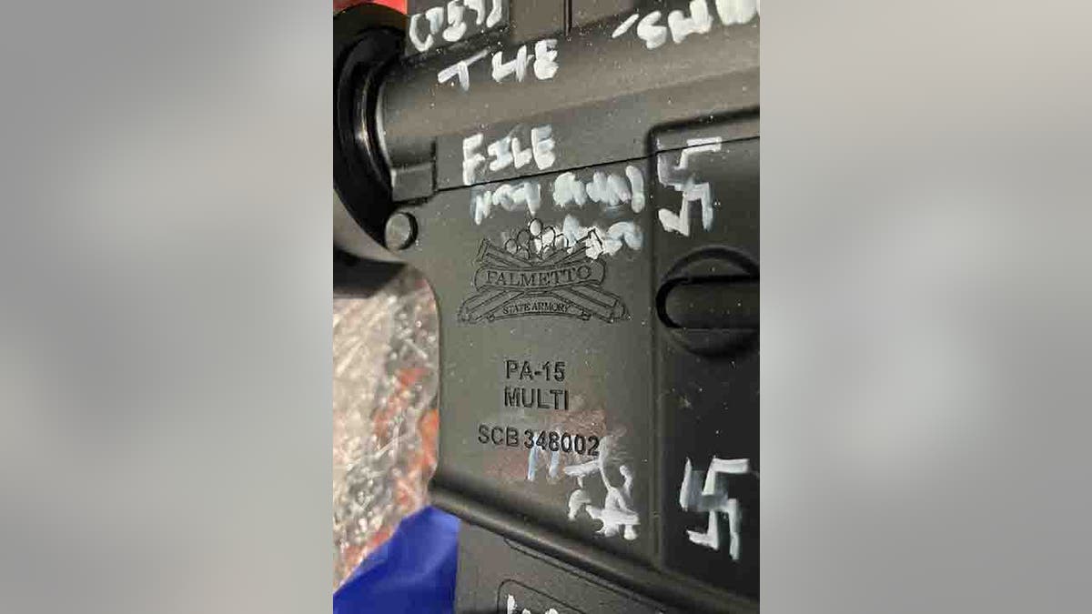 swastikas painted on firearm