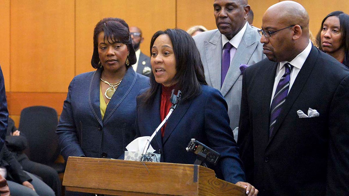 Fulton County Chief Senior Assistant District Attorney Fani Willis speaks during a news conference
