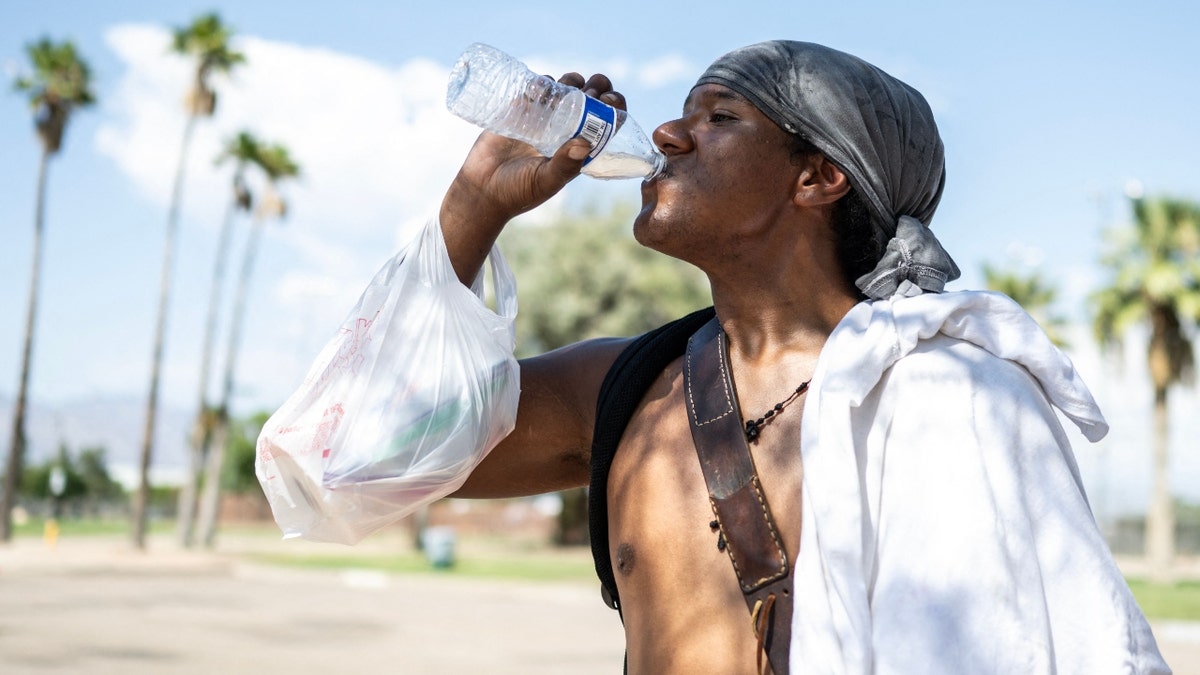 A man drinks water in Arizona