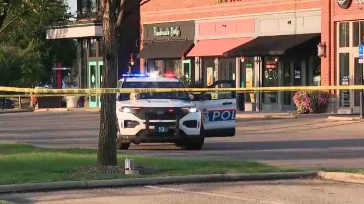 police car and tape at scene