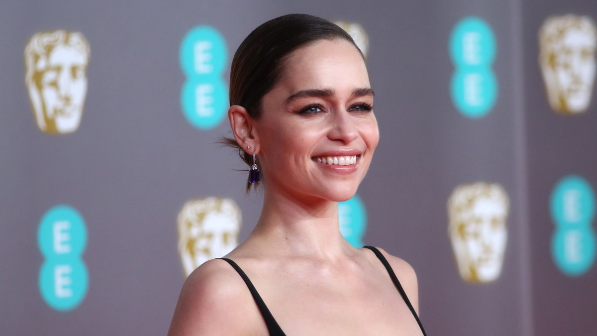 Emilia Clarke posing on the red carpet