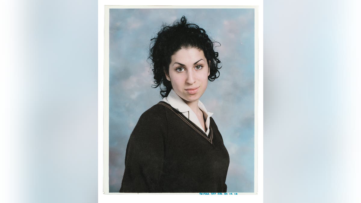 Amy Winehouse in a school uniform