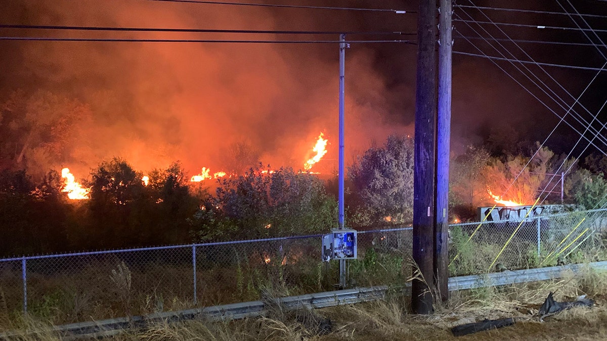 encampment brush fire