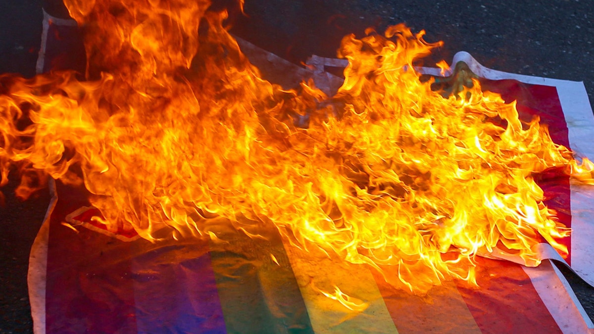 Iraq burning pride gay flag