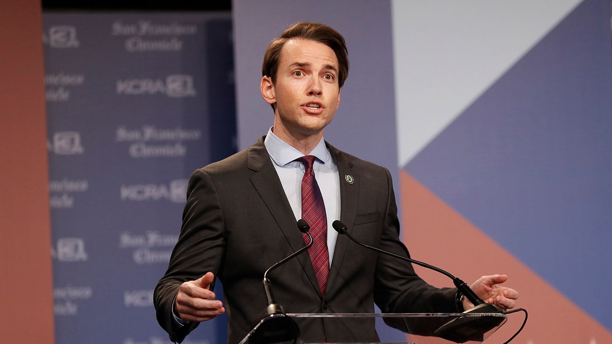 Kevin Kiley on stage during a debate