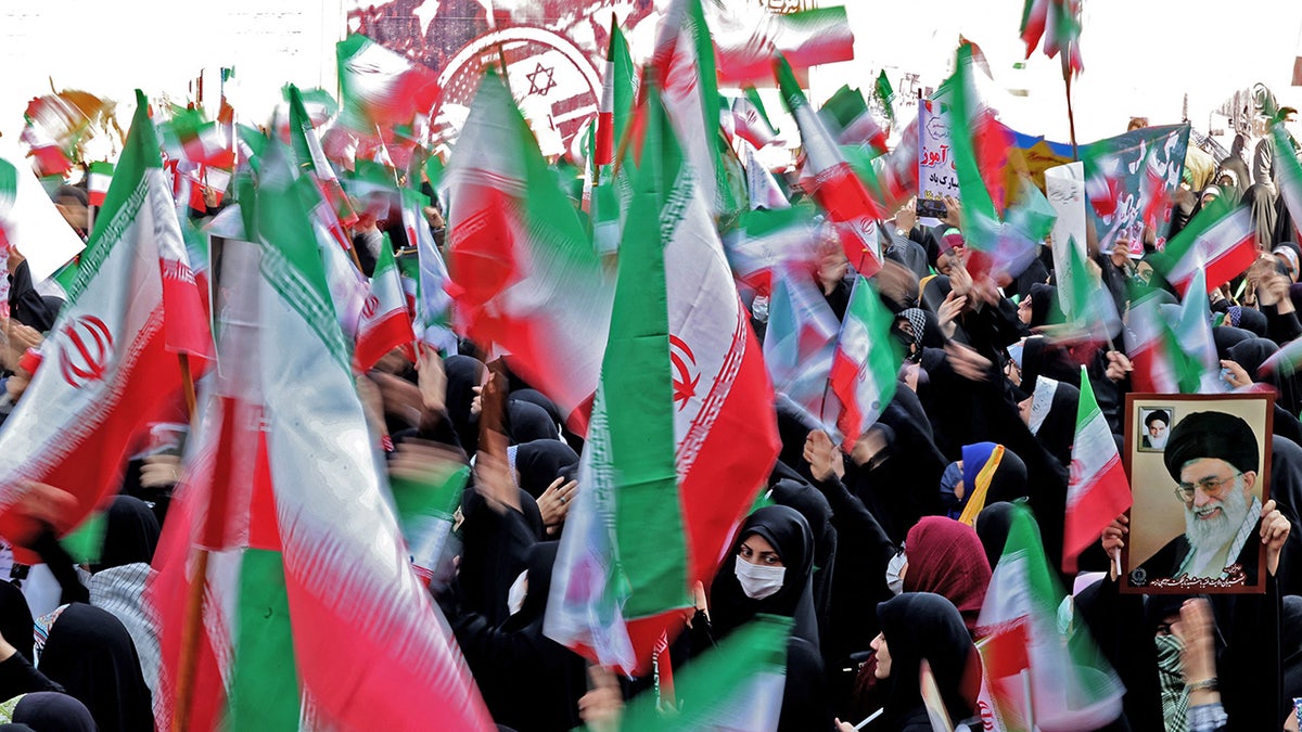 Iranian flags waved outside former US embassy