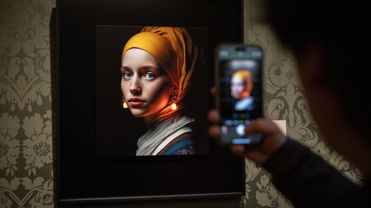 An AI generated portrait is photographed by someone's phone