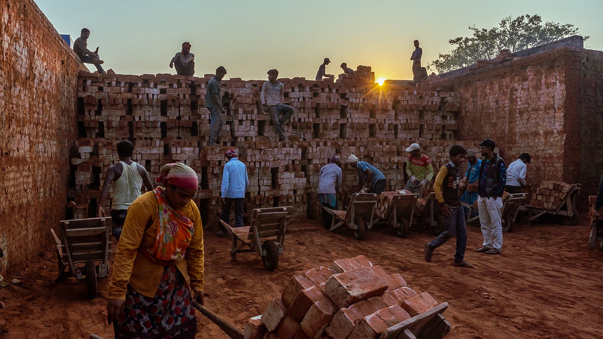 Nepalese workers at brick site