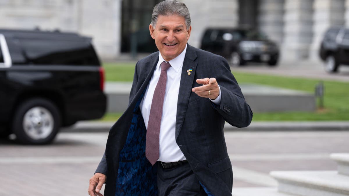 Manchin points and walks by Capitol