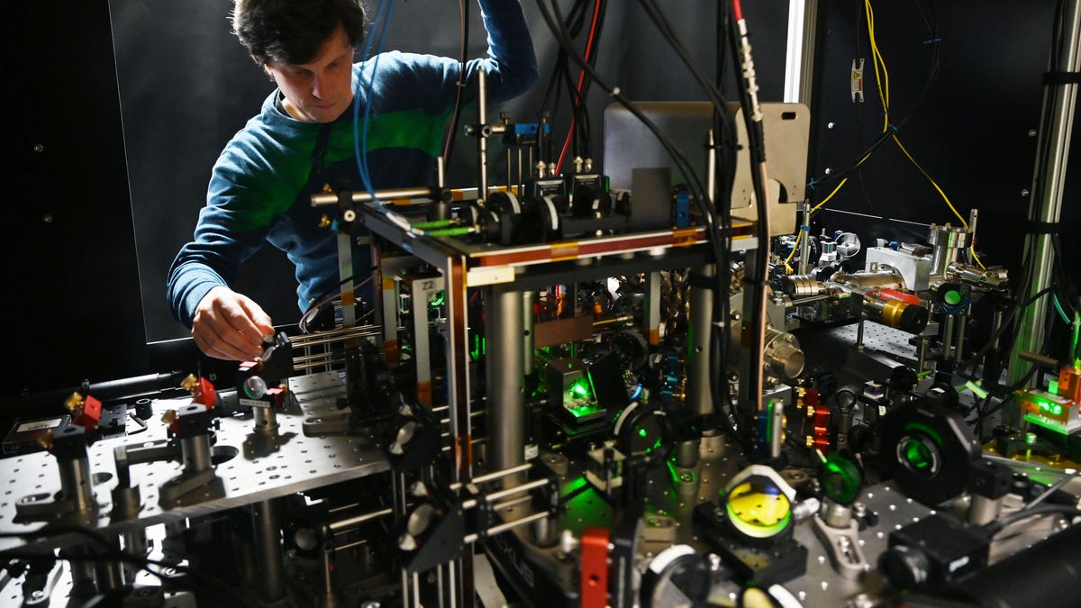 man in a quantum computer lab with equipment