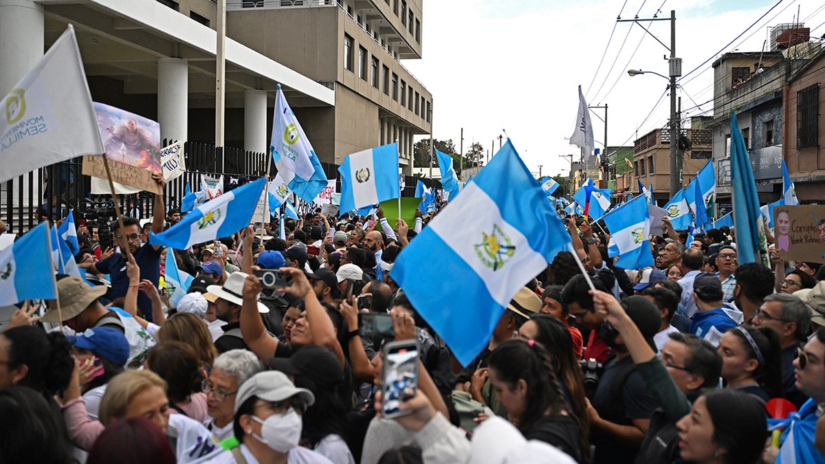 People with Guatemalan flags