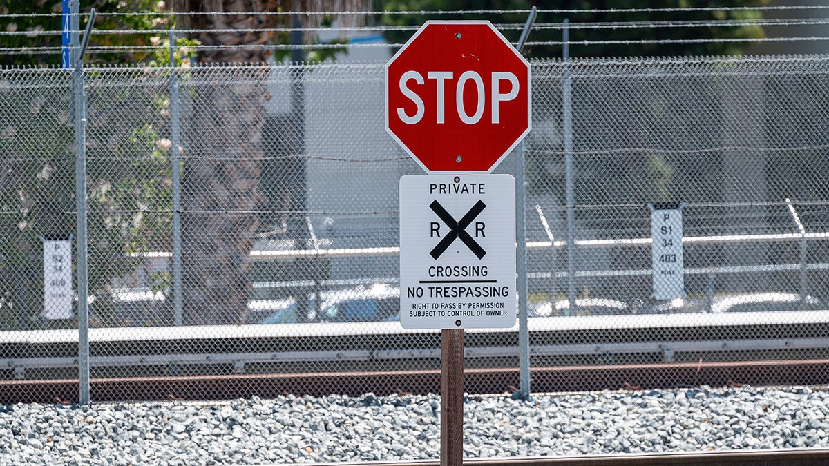 A stop sign near tracks