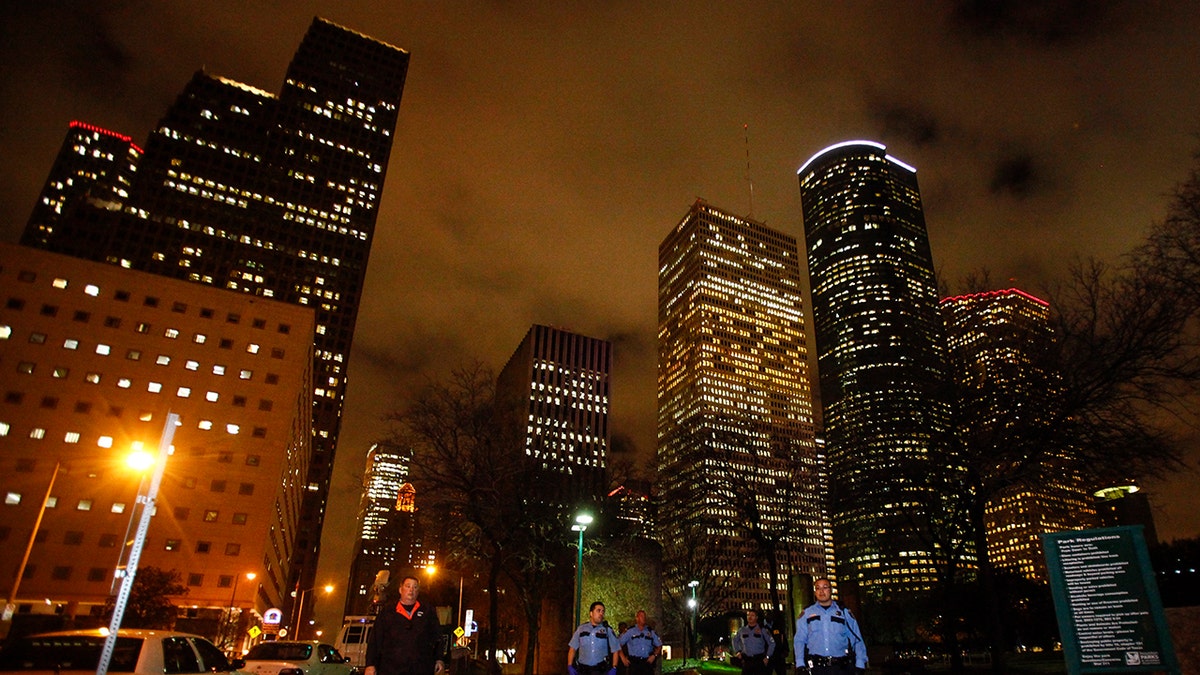 Houston skyline, police officers