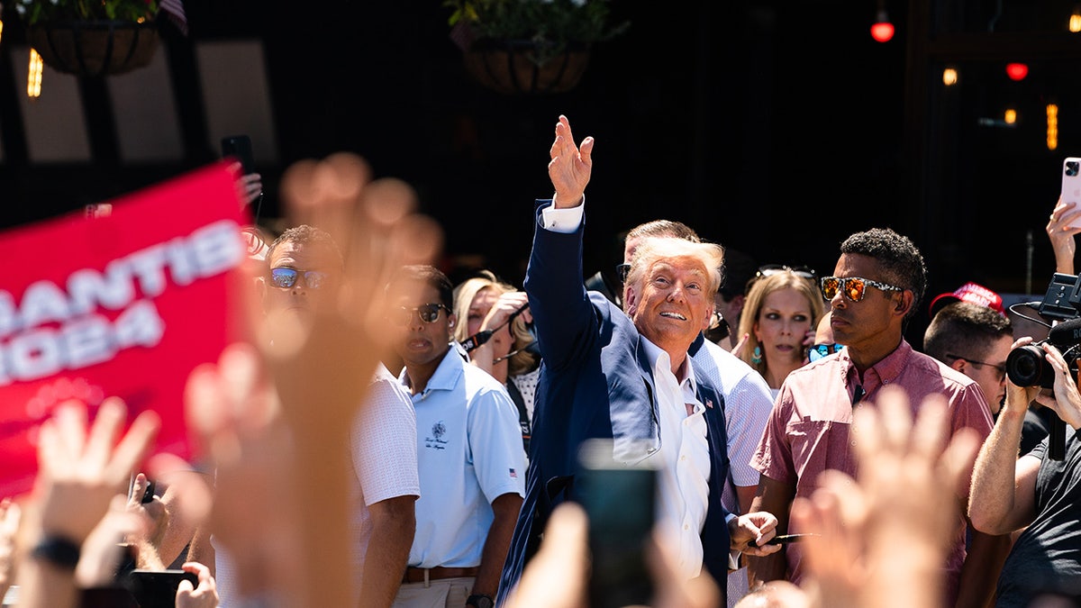 Trump surrounded by supporters in Iowa