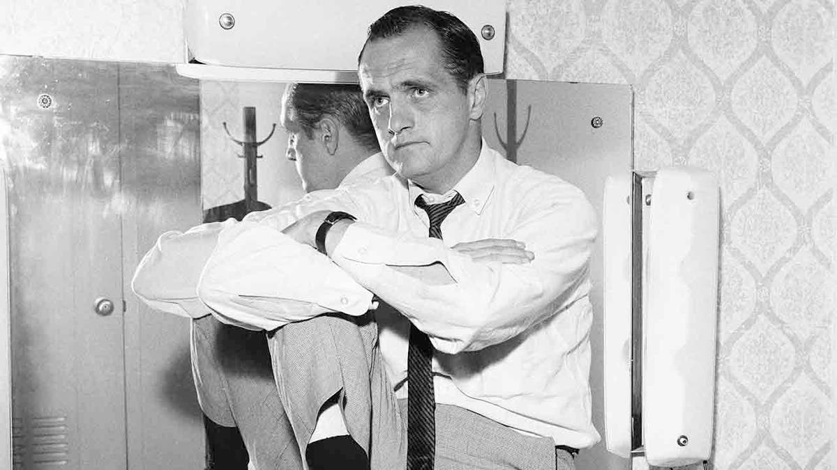 Bob Newhart posing on set