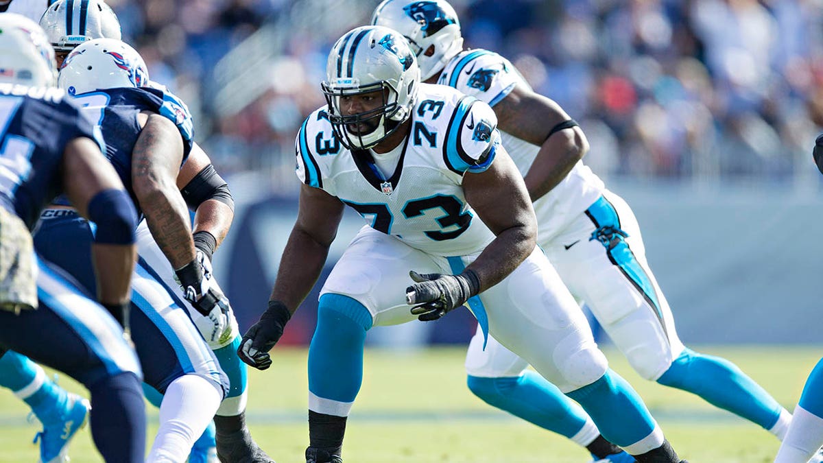 Oher playing for the Panthers 