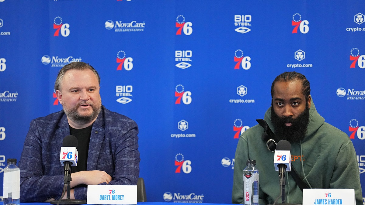 Daryl Morey and James Harden speak to the media