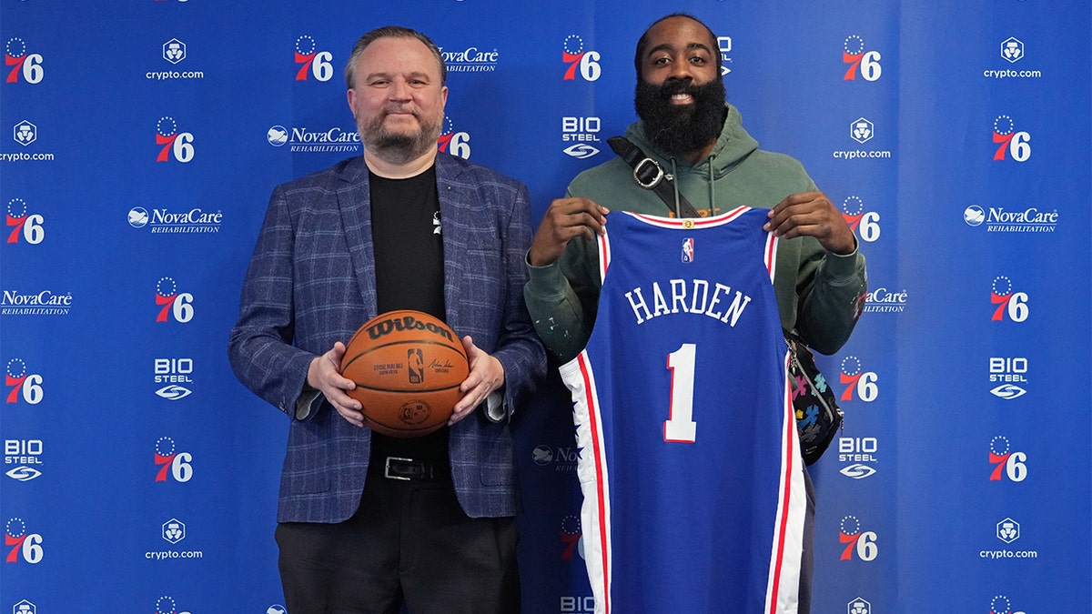 Daryl Morey and James Harden pose for a photo