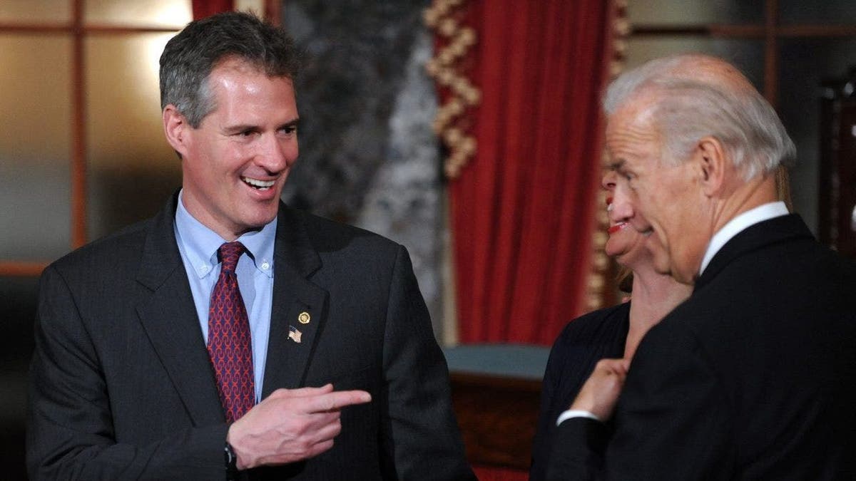 Senator Scott Brown (L)(R-MA) jokes with Vice President Joe Biden