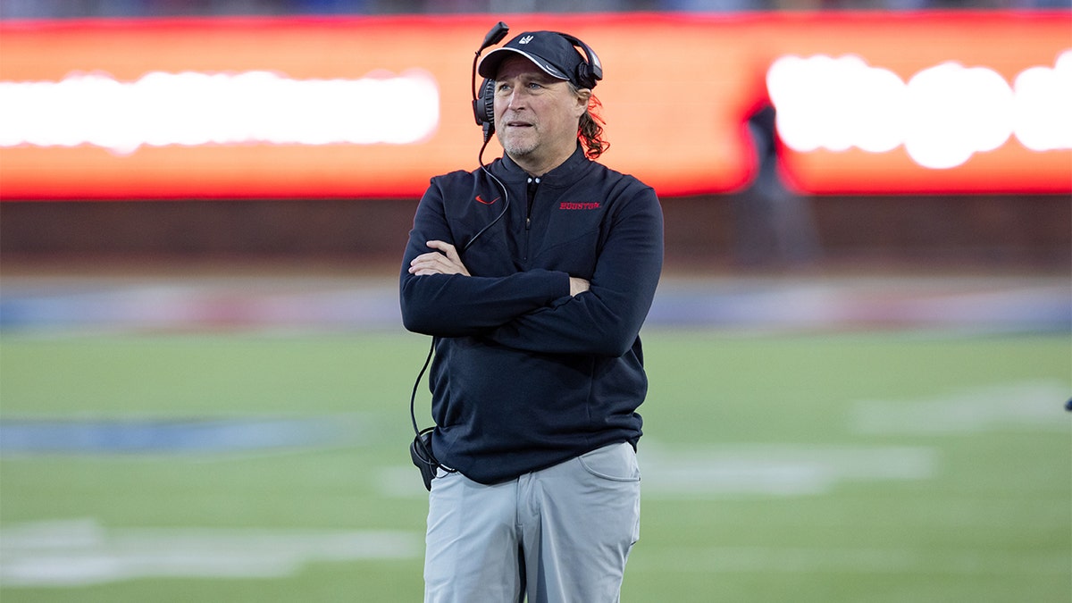 Dana Holgorsen coaches against SMU