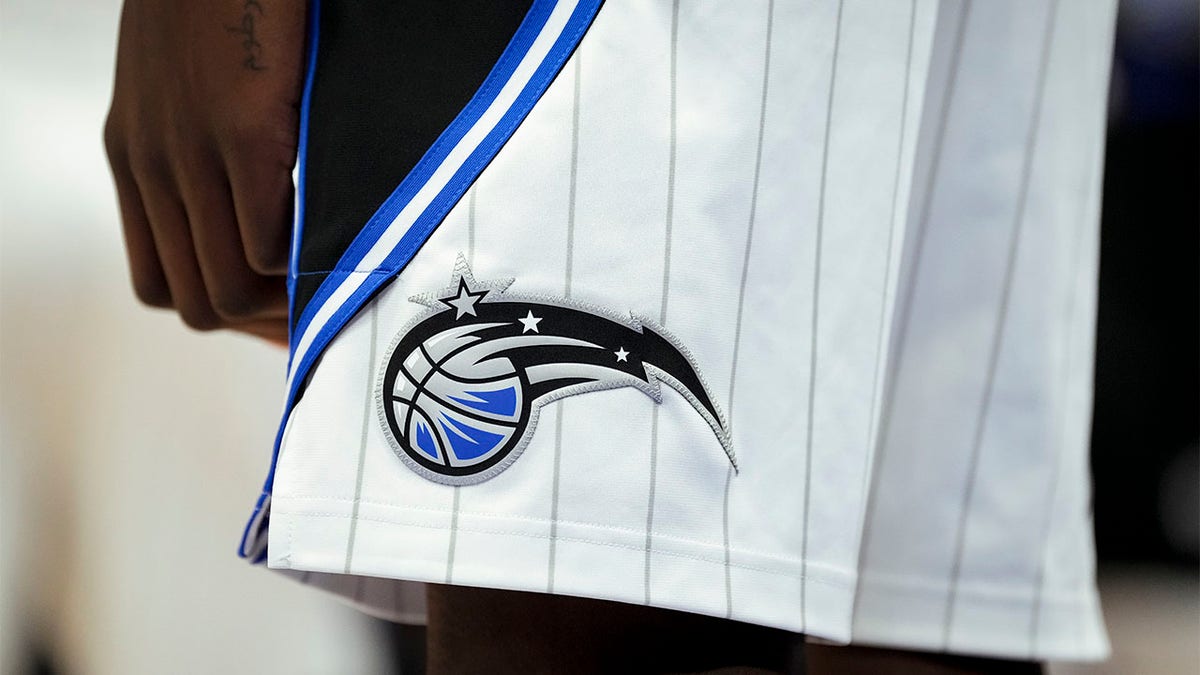 The Orlando Magic logo on a uniform