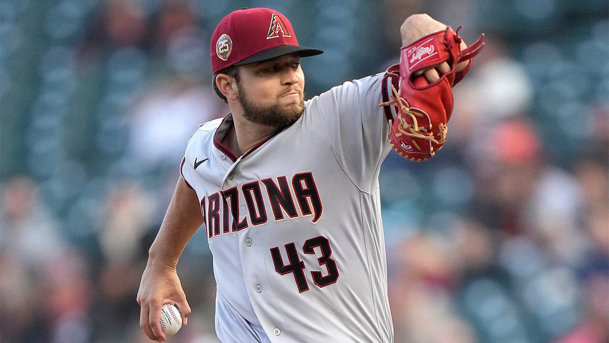 Slade Cecconi pitches for the Diamondbacks