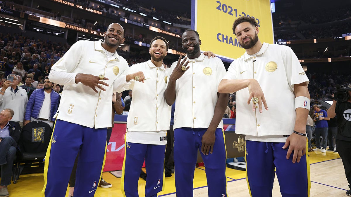Members of the Warriors show off their championship rings