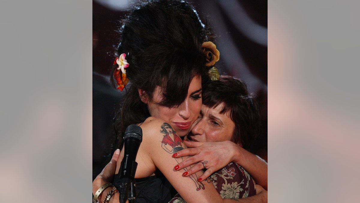 Amy Winehouse hugging her mother