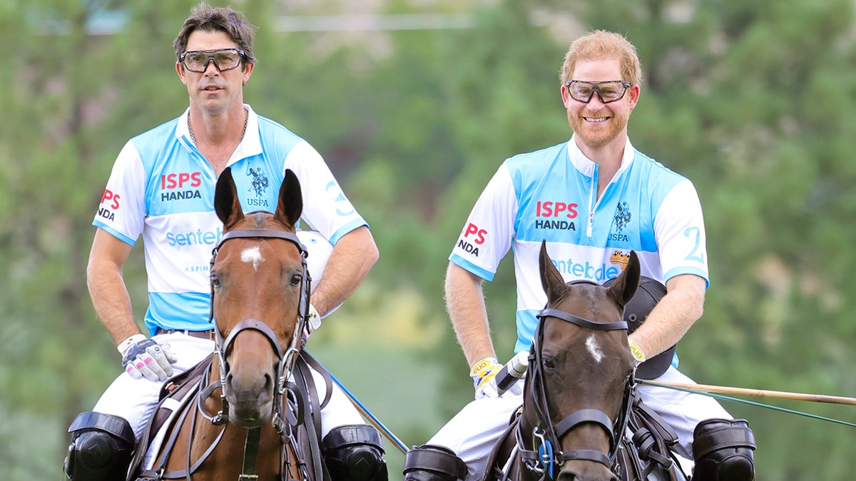 Ignacio Figueras and Prince Harry wearing matching polo uniforms while riding horses